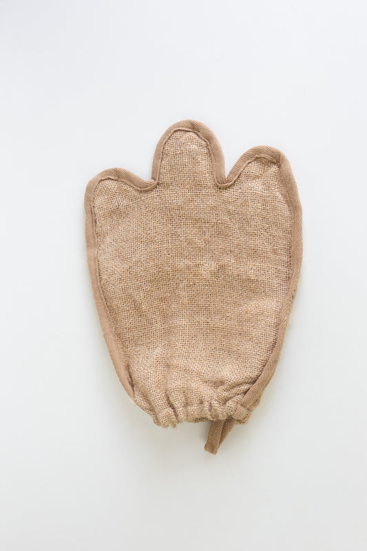 Brown Jute loofah glove on a white background